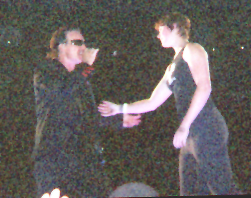 Tara beckons Bono to follow her